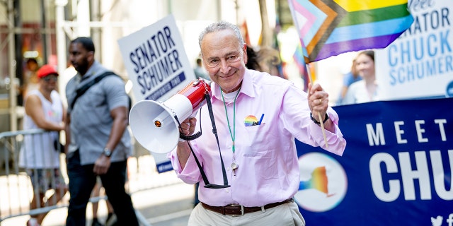 U.S. Senator Chuck Schumer marches during the 2022 New York City Pride March on June 26, 2022 in New York City.