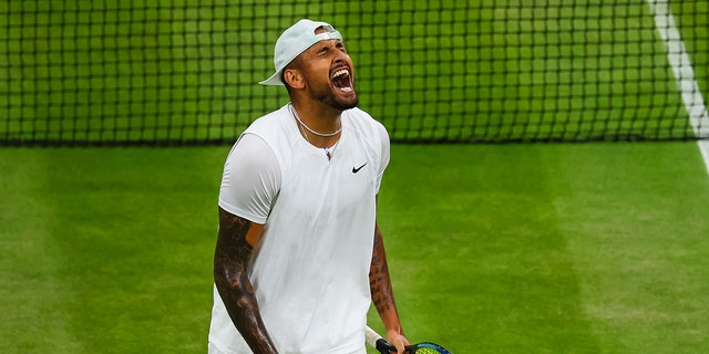 Nick Kyrgios celebrates his victory over Stefanos Tsitsipas during Wimbledon at All England Lawn Tennis and Croquet Club on July 2, 2022, in London.