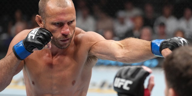 Donald Cerrone strikes at Jim Miller in a welterweight fight during the UFC 276 event at T-Mobile Arena on July 02, 2022 in Las Vegas, Nevada. (Photo by Jeff Bottari/Zuffa LLC)