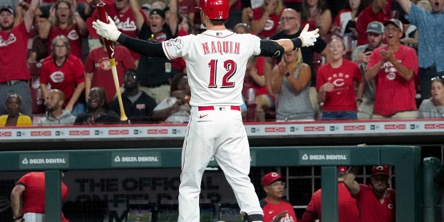Tyler Naquin of the Cincinnati Reds celebrates after Matt Wisler of the Tampa Bay Rays balked to end a game 2-1 in the 10th inning at Great American Ball Park July 8, 2022, in Cincinnati.