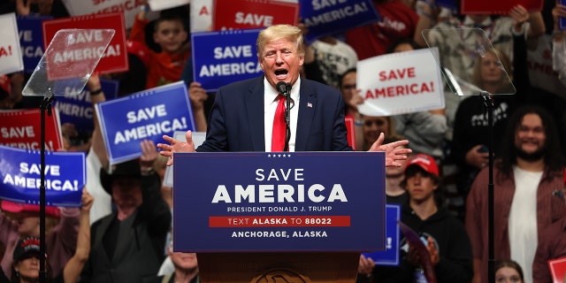 Former US President Donald Trump speaks at a rally at Alaska Airlines Center on July 09, 2022 in Anchorage, where he campaigned with House candidate and former Alaska Gov.  Sarah Palin and Senate candidate Kelly Tshibaka.