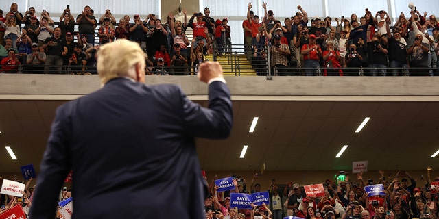 Former U.S. President Donald Trump greets supporters during a "Save America" rally at Alaska Airlines Center on July 09, 2022 in Anchorage, Alaska. 