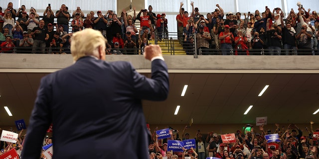 Former US President Donald Trump greets supporters during a "Save America" rally at Alaska Airlines Center on July 09, 2022 in Anchorage, Alaska. 