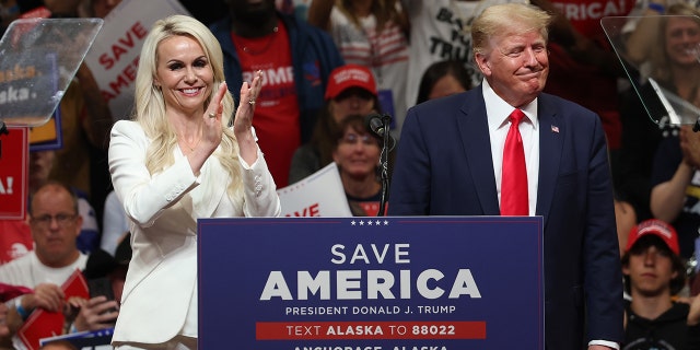 Republican U.S. Senate candidate Kelly Tshibaka (L) stands on stage with former U.S. President Donald Trump (R) during a "Save America" rally at Alaska Airlines Center on July 09, 2022 in Anchorage, Alaska.  (Photo by Justin Sullivan/Getty Images)