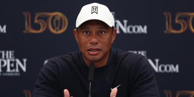 Tiger Woods of the United States spoke at a press conference during a practice round prior to the 150th Open at the St Andrews Old Course on July 12, 2022 in St Andrews, Scotland. 