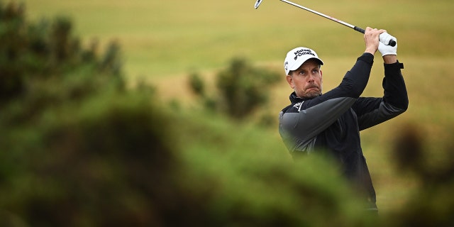 Henrik Stenson plays his second shot on the fourth hole during The 150th Open at St. Andrews Old Course on July 15, 2022, in St. Andrews, Scotland.