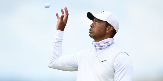 Tiger Woods catches a ball during The 150th Open at St. Andrews Old Course July 15, 2022, in St. Andrews, Scotland.