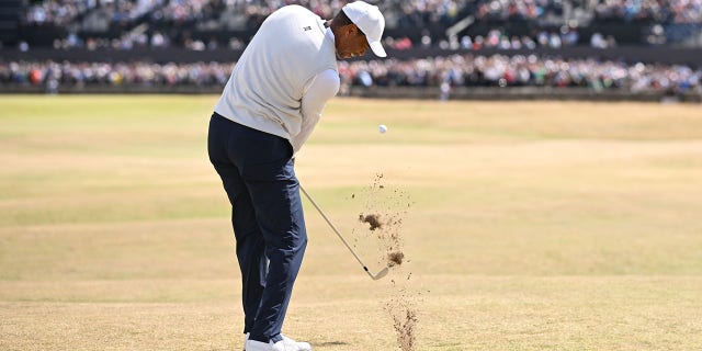 Tiger Woods tees off on the 17th during The 150th Open at St. Andrews Old Course July 15, 2022, in St Andrews, Scotland.