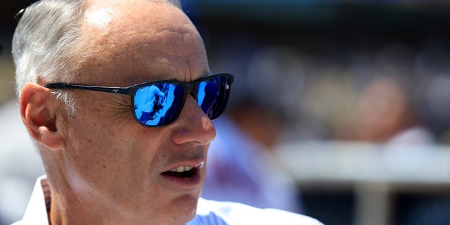 Commissioner Robert D. Manfred Jr. watches the Gatorade All-Star Workout Day at Dodger Stadium on July 18, 2022, in Los Angeles, California.
