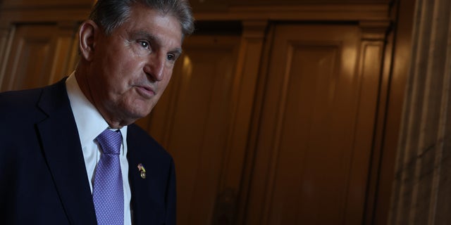 WASHINGTON, DC - JULY 21: Sen. Joe Manchin (D-WV) walks out of the Senate Chambers in the U.S. Capitol on July 21, 2022 in Washington, DC. The Senate wrapped up their votes for the week and is expected to consider legislation for legalizing marijuana and the House-approved bill protecting same-sex marriage. (Photo by Anna Moneymaker/Getty Images)