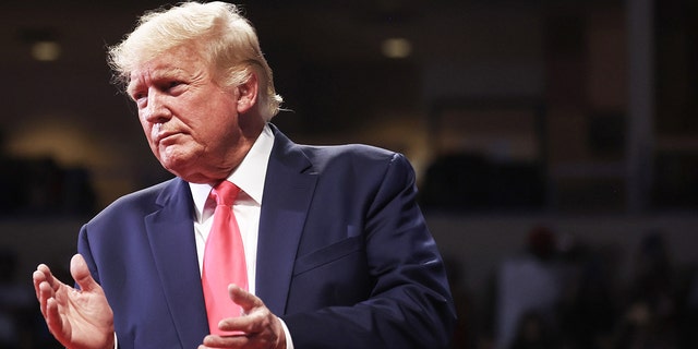 Former President Trump applauds at a rally in support of Arizona GOP candidates on July 22, 2022 in Prescott Valley, Arizona. Arizona's primary election will take place August 2.