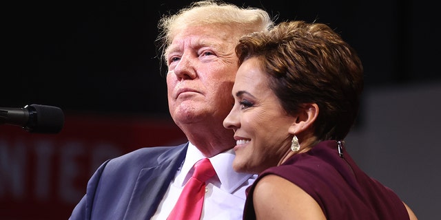 Former President Donald Trump (L) embraces Republican candidate for governor Kari Lake at a ‘Save America’ rally in support of Arizona GOP candidates on July 22, 2022 in Prescott Valley, Arizona.