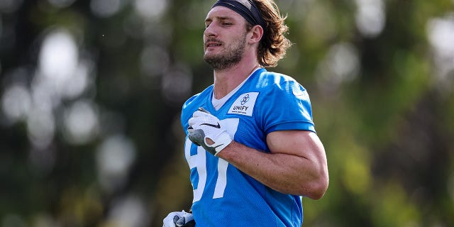 Joey Bosa of the Los Angeles Chargers warms up during training camp at Jack Hammett Sports Complex July 27, 2022, in Costa Mesa, Calif.