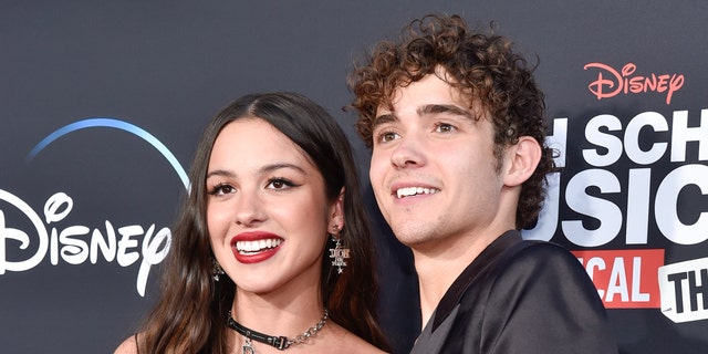 BURBANK, CALIFORNIA - JULY 27: Olivia Rodrigo (L) and Joshua Bassett attend Disney+ "High School Musical: The Musical: The Series" Season 3 Premiere at Walt Disney Studios on July 27, 2022 in Burbank, California. (Photo by Rodin Eckenroth/WireImage)