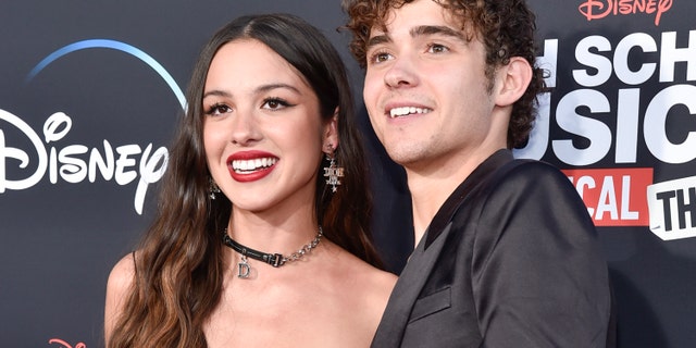 BURBANK, CALIFORNIA - JULY 27: Olivia Rodrigo (L) and Joshua Bassett attend Disney+ "High School Musical: The Musical: The Series" Season 3 Premiere at Walt Disney Studios on July 27, 2022 in Burbank, California. (Photo by Rodin Eckenroth/WireImage)