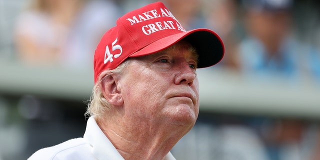 Trump looks on at LIV Golf pro-am
