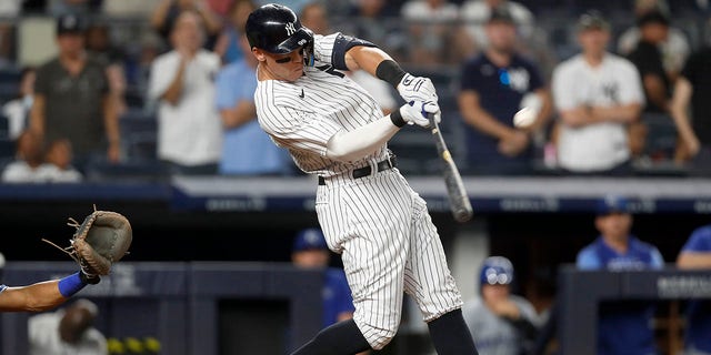 Aaron Judge of the New York Yankees connects on his eighth-inning grand slam against the Kansas City Royals at Yankee Stadium on July 29, 2022 in New York City. 