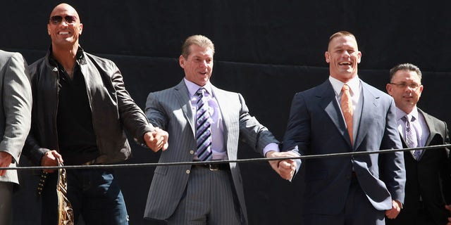 The Rock, Vince McMahon, John Cena and Michael Cole attend the WrestleMania 29 press conference at Radio City Music Hall on April 4, 2013 in New York City.
