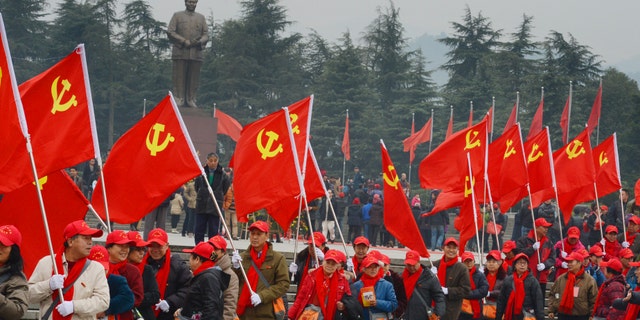 Seventy elder party members from Bejing arrive to commemorate the 121st Aniversary Of Chairman Mao's Birthday on December 2014, in Shaoshan, Hunan province of China.