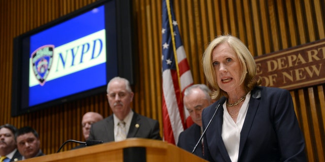 Police Commissioner Bill Bratton holds press conference at Police Headquarters to discuss the arrest of 13 members of the GS9 gang, who included rap star Shmoney Shmurda with weapons recovered during bust. Speaking is Bridget Brennan, New York City's Special Narcotics Prosecutor. (Photo By: Susan Watts/NY Daily News via Getty Images)