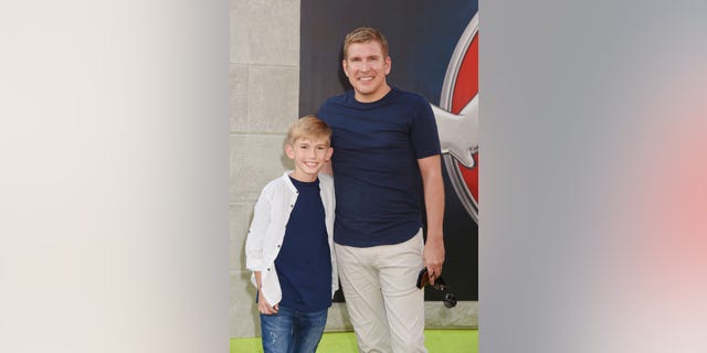 Todd Chrisley and son Grayson arrive at the premiere of Sony Pictures' 'Ghostbusters' in 2016.