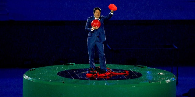 Japan Prime Minister Shinzo Abe is seen during the 'Love Sport Tokyo 2020' segment during the Closing Ceremony on Day 16 of the Rio 2016 Olympic Games at Maracana Stadium in Rio de Janeiro, Brazil on August 21, 2016.