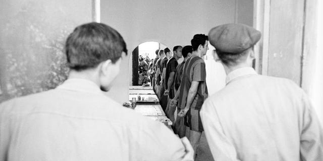 American prisoners of war in a cell at the Hanoi Hilton prior to their release in 1973 in Hanoi, Vietnam.  