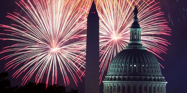 Fireworks explode at the National Mall in Washington, DC