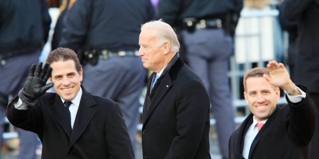 Vice President Joe Biden and his sons Hunter Biden, left, and Bo Biden walk at the inaugural parade on January 20, 2009, in Washington, DC. 