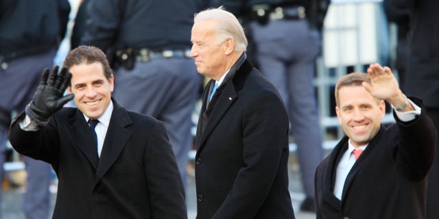 Vice President Joe Biden and his sons Hunter Biden, left, and Bo Biden walk at the inaugural parade on January 20, 2009, in Washington, DC.
