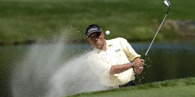 Robert Gamez blasts from the sand on the 11th hole during second-round play at the PGA Tour's Player's Championship in Ponte Vedra Beach, FL March 26, 2004.