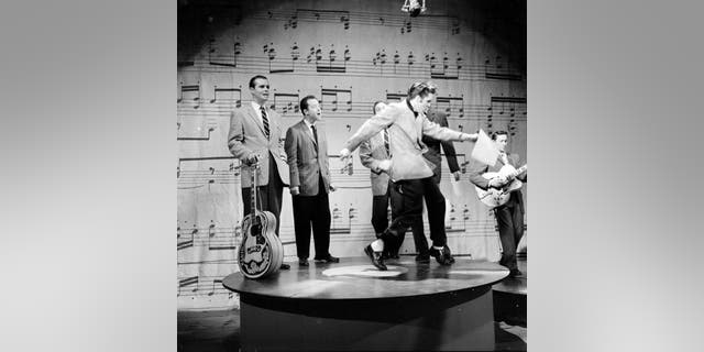 Rock ‘n’ roll musician Elvis Presley performs on stage on "The Ed Sullivan Show" on Jan. 6, 1957, in New York City, N.Y.