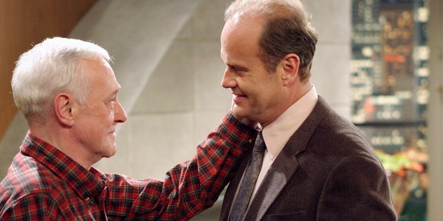 FRASIER -- "Goodnight, Seattle" Episode 21 -- Pictured: (l-r) John Mahoney as Martin Crane, Kelsey Grammer as Dr. Frasier Crane