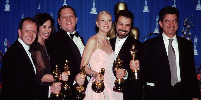 From left: David Parfitt, Donna Gigliotti, Harvey Weinstein, Gwyneth Paltrow, Edward Zwick, Mark Norman after winning the Oscar for Best Film for ‘Shakespeare in Love’ in 1999.