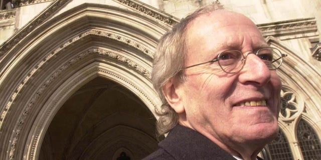 Composer John Barry outside the High Court.