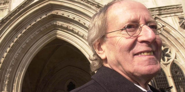 Composer John Barry outside the High Court.