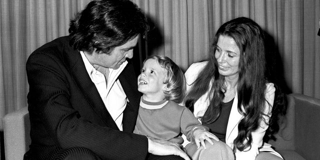 Johnny Cash and his wife June Carter arrived in Australia with their son John Carter Cash in 1973.