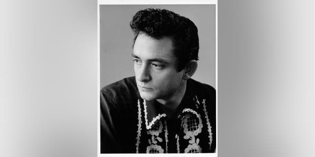 Johnny Cash poses for a portrait in circa 1957.