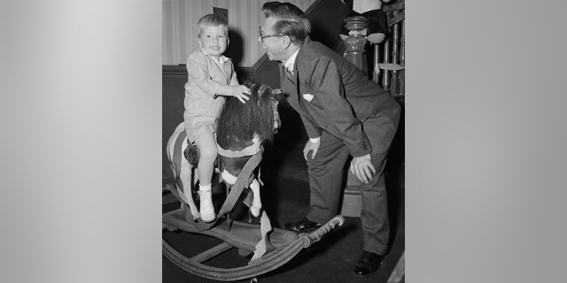 Mickey Rooney Jr., seen here as a child with his father, followed a different path in showbiz.