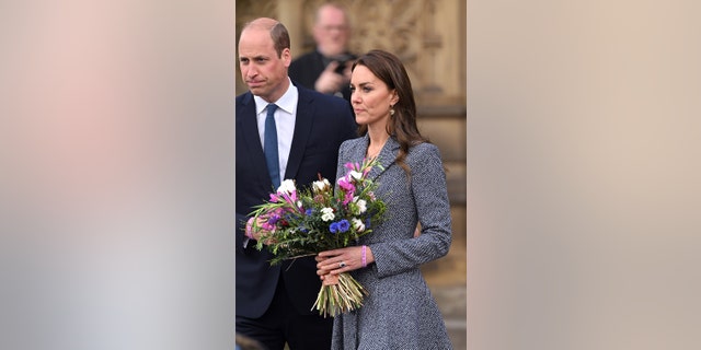 Catherine, Duchess of Cambridge, and Prince William, Duke of Cambridge, depart after attending the official opening of the Glade of Light Memorial at Manchester Cathedral May 10, 2022, in Manchester, England.