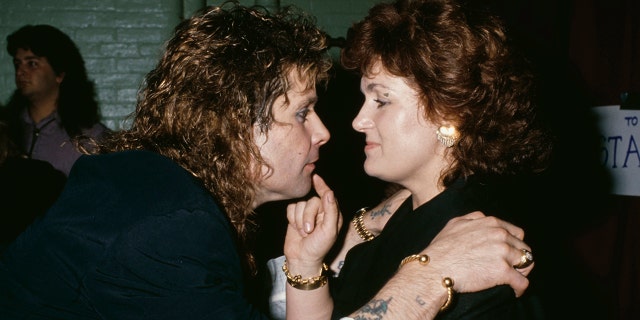 British singer and songwriter Ozzy Osbourne goes face-to-face with his British manager and wife, Sharon Osbourne, circa 1985.