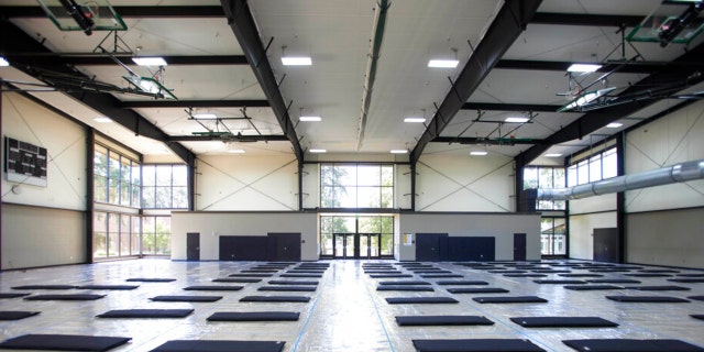 Beds are laid out in a cooling center at the Charles Jordan Community Center in Portland, Ore., July 26, 2022. 