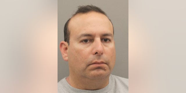 Hector Campos, 48, killed is neighbor in broad daylight amid a feud at began when she drove his then-wife and infant child to the airport so they could fly to Mexico, prosecutors said.