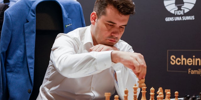 Ian Nepomniachtchi, of Russia, competes against Richard Rapport, of Hungary, in round 12 of the FIDE Candidates Chess Tournament at the Santoña Palace on July 3, 2022, in Madrid, Spain.