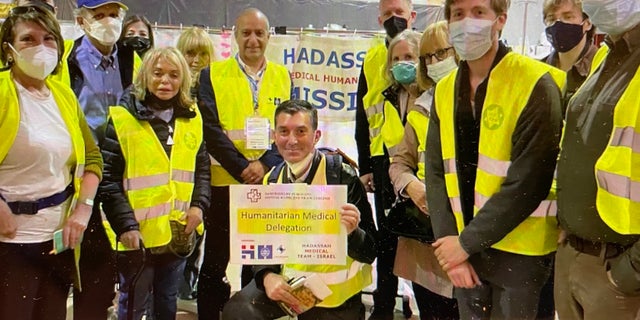 A group of Temple Emanu-El members are shown during a recent trip to the Ukraine-Poland border to help bring comfort to displaced Ukrainians — people they "were privileged to meet," the travelers said afterward.