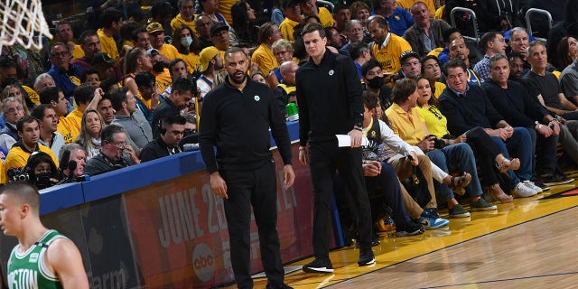 Head Coach Ime Udoka and Assistant Coach Will Hardy of the Boston Celtics look on during Game One of the 2022 NBA Finals on June 2, 2022 at Chase Center in San Francisco, California.
