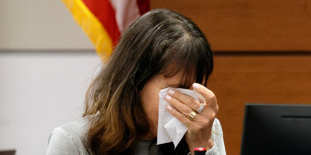Teacher weeps on the stand July 20, 2022, at the sentencing trial of gunman Nikolas Cruz, as she recalls the murder of two of her students at Marjory Stoneman Douglas High School during the Parkland mass shooting that killed 17.