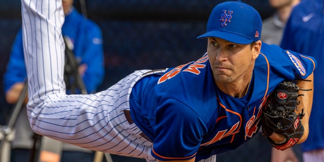 New York Mets pitcher Jacob deGrom throws during a spring training workout at Clover Park, in Port St. Lucie, Florida, on March 14, 2022. 