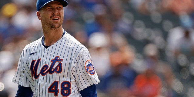 Jacob deGrom #48 of the New York Mets reacts walking to the dugout in the fifth inning against the Milwaukee Brewers during game one of a doubleheader at Citi Field on July 7, 2021 in the Flushing neighborhood of the Queens borough of New York City.