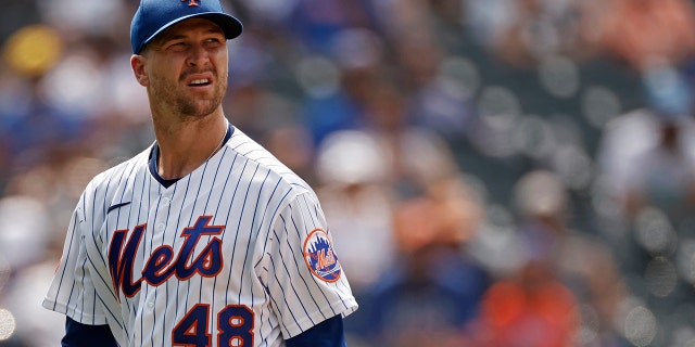 Jacob deGrom #48 of the New York Mets reacts walking to the dugout in the fifth inning against the Milwaukee Brewers during game one of a doubleheader at Citi Field on July 7, 2021 in the Flushing neighborhood of the Queens borough of New York City.